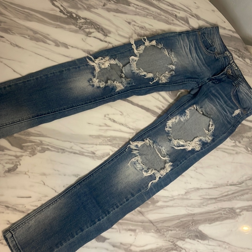 Machine distressed jeans